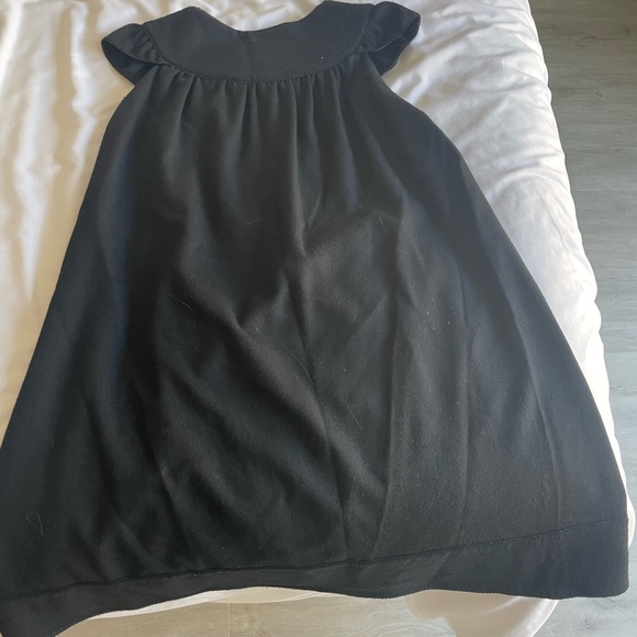 NAVE. Size women’s 2 , but runs big! More like a 6. Color black. - Picture 10 of 14